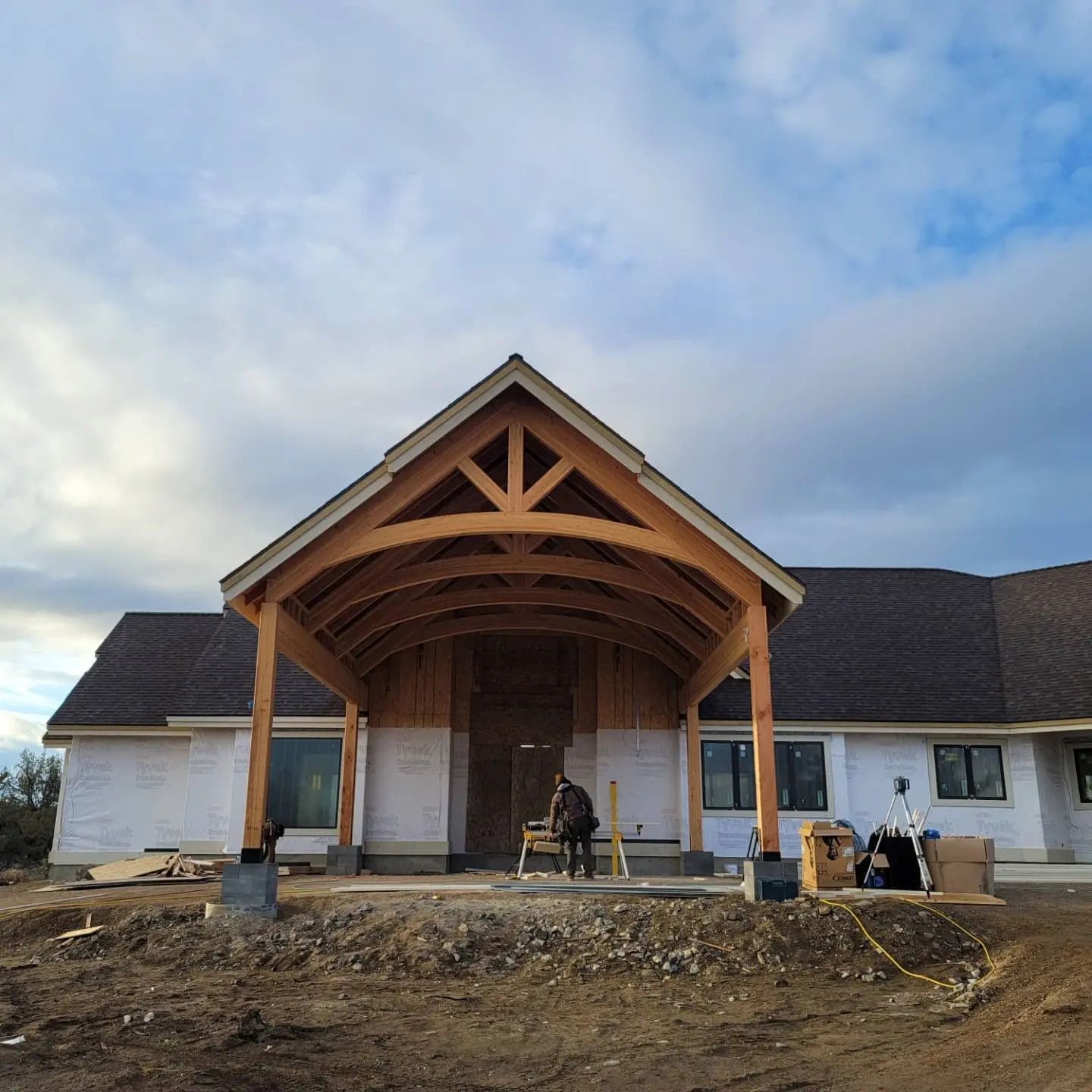 Grand timber-framed entryway under construction for a luxury home in Eagle Crest, OR.