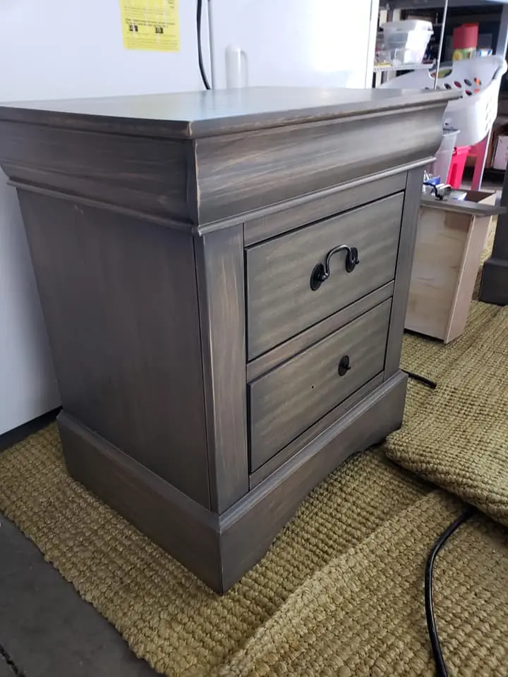 Completed nightstand restoration featuring a durable, satin-black tinted lacquer finish and new hardware.