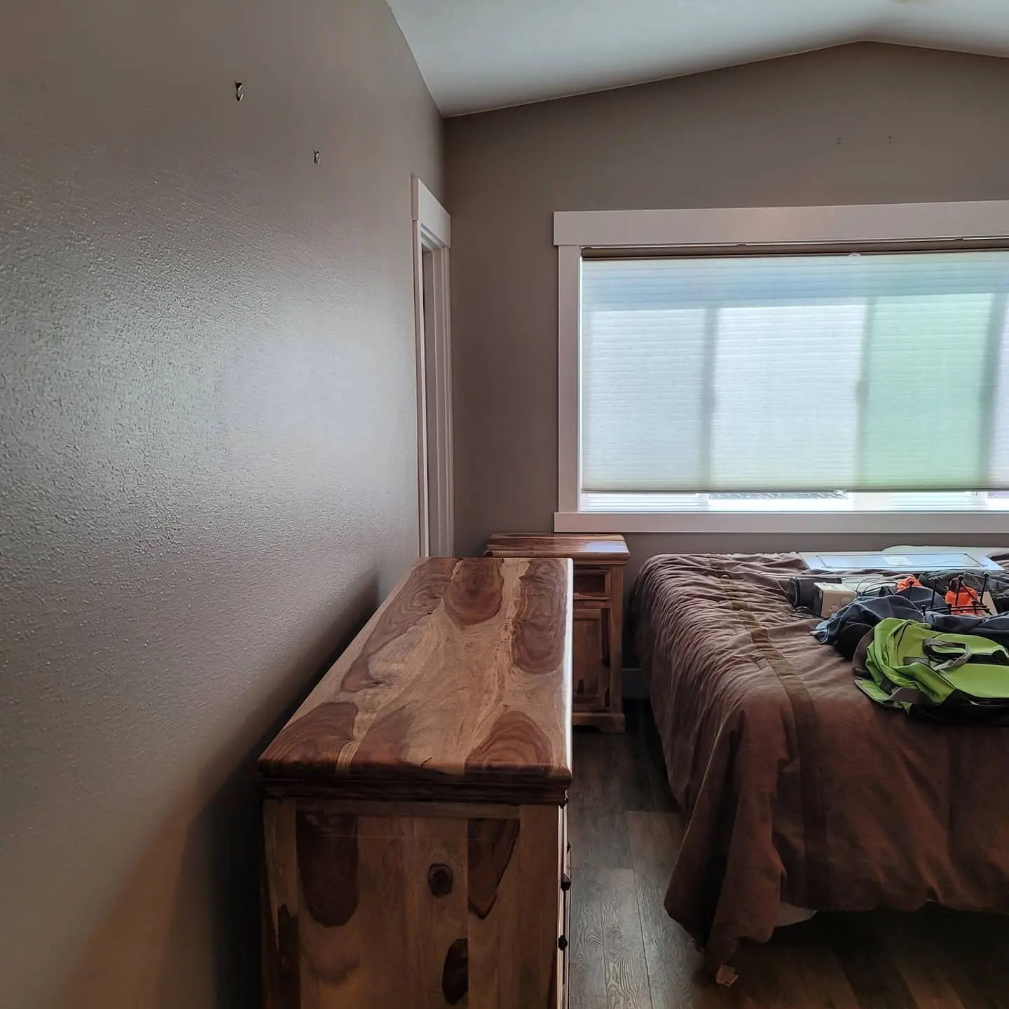 Close-up of a master suite in Redmond featuring a smooth, professional paint application on the walls and ceiling.