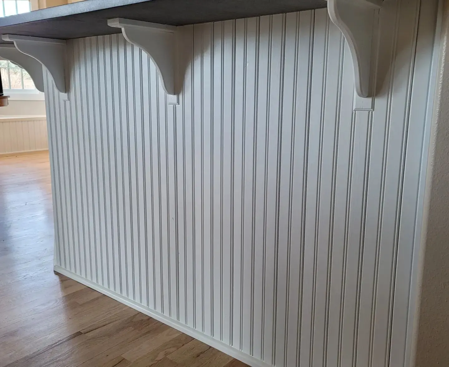 Professional lacquer finish on the beadboard underside of a kitchen breakfast bar in Sisters.